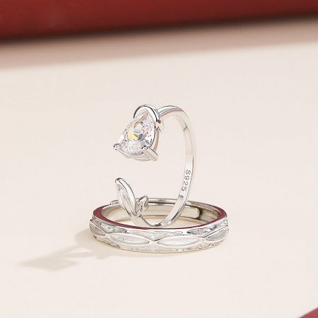 925 Sterling Silver Rose Design Adjustable Couple Promise Ring Set - A beautifully detailed 925 sterling silver couple promise ring set, one featuring a heart-shaped stone and the other an intricate band design.