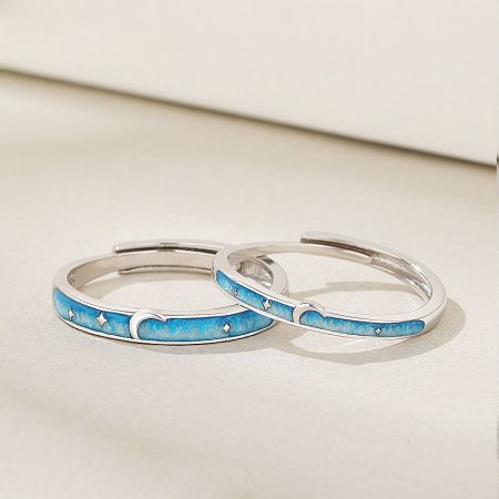 Side profile of the adjustable 925 silver rings, showing the craftsmanship and enamel work.