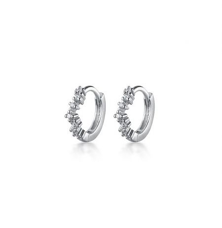 A detailed close-up of the 925 Sterling Silver Mini Huggie Earrings featuring sparkling cubic zirconia stones.