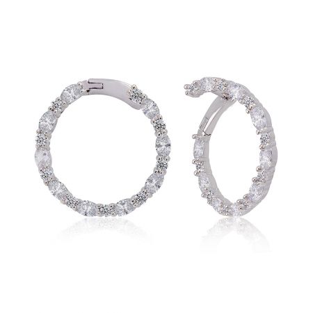 Side view of the Glitzy Round Hoop Earring, showcasing the detailed prong setting of the clear gemstones and the secure hinged clasp.