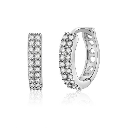 A pair of Double Row Pave Set Huggie Earrings displayed to show their brilliant sparkle and hoop design.