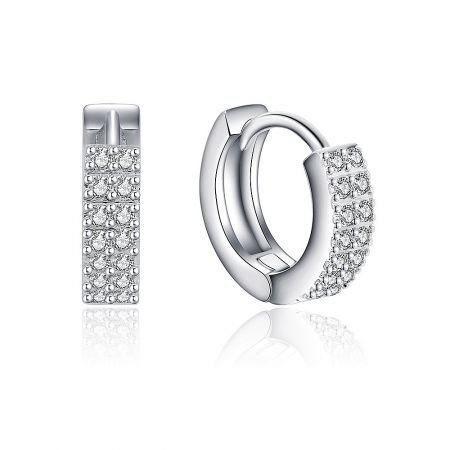 Detailed close-up of the silver hoop earring, highlighting the intricate claw setting of the white cubic zirconia stones.