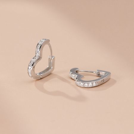 925 Sterling Silver Heart Hoop Earrings with Zircons - A pair of 925 sterling silver heart hoop earrings, elegantly accented with sparkling cubic zirconia stones, displayed on a white background.