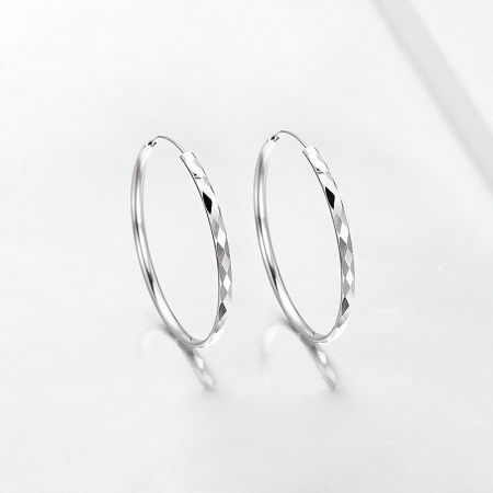 925 Sterling Silver Diamond Texture 42mm Hoop Earrings - A close-up product shot of 925 sterling silver hoop earrings, featuring a detailed diamond-cut texture and a polished finish.