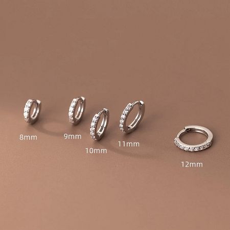 Size comparison of silver zircon huggie hoop earrings with rhinestones, from 8mm to 12mm.
