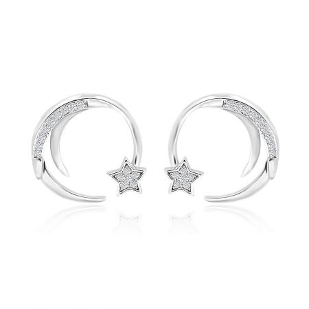 Shooting Star Earrings - A detailed close-up of the Shooting Star Earrings, showcasing the rhodium-plated finish and the brilliant white cubic zirconia set in a star-shaped charm.