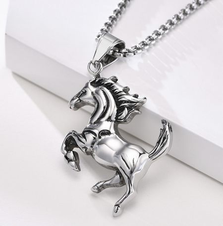 Side angle view of the stainless steel horse pendant.