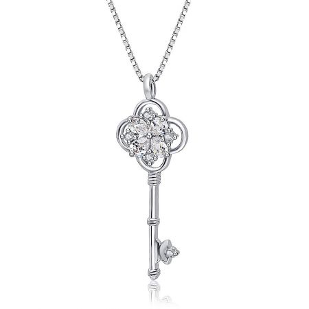 Angled shot of the silver key pendant, highlighting the brilliance of the diamond-like accents.