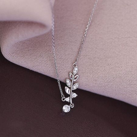 The sterling silver leaf necklace in a silver finish, detailed with CZ stones.