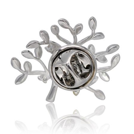 Detailed view of the Silver Tree CZ Brooch Pin from an angle, highlighting the metallic sheen and leaf details.