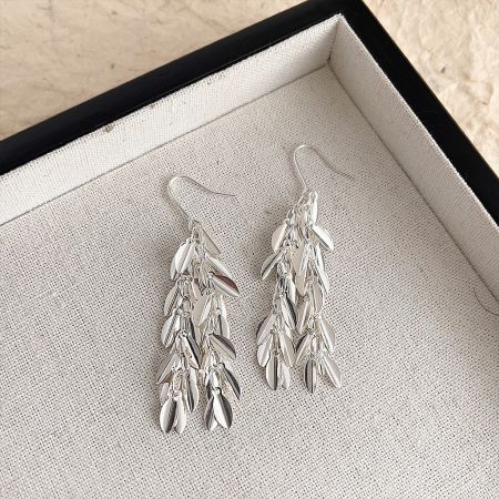 Silver Plated Leaves Statement Hook Drop Earrings (5 Pairs) - A pair of silver plated, leaf-shaped statement earrings with a cascading design, presented in a black jewelry box.