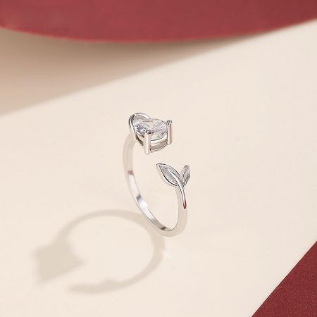 Close-up of the adjustable sterling silver promise ring with a unique design.