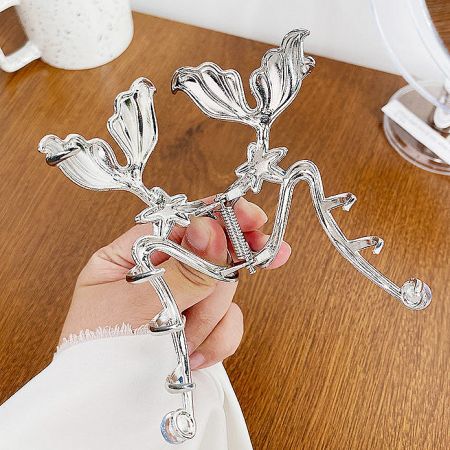 The back of the hair clip, showing the durable silver metal clasp mechanism.