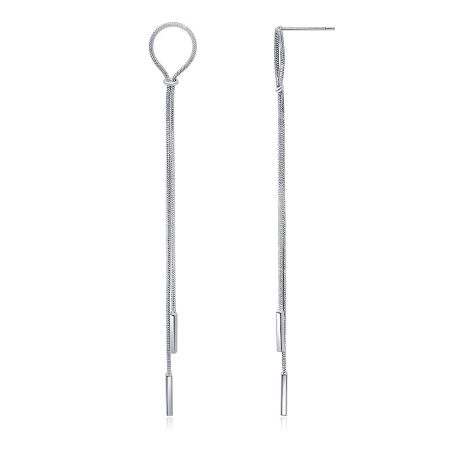 Close-up view highlighting the polished finish of the brass snake chain earrings.