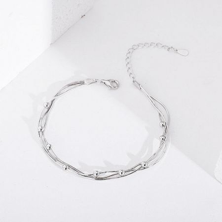 Detailed shot of the 925 sterling silver bracelet's clasp and multi-strand design.