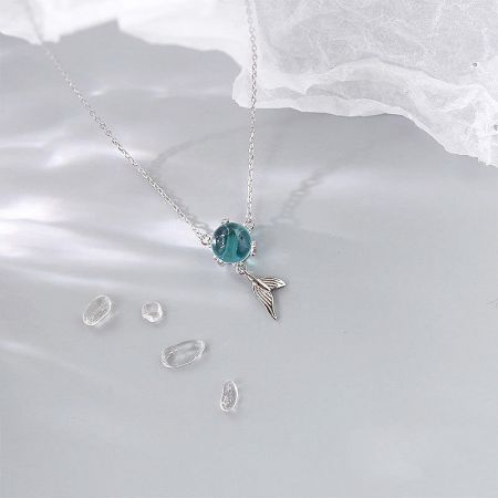 Full view of the S925 silver necklace showcasing the pendant and clavicle chain.