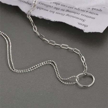 Front view of the sterling silver double circle pendant necklace on a clean background.