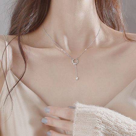 Full view of the 925 sterling silver necklace with its beautiful zircon tassel pendant.