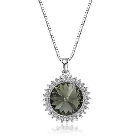 Close-up view of the Swarovski stone cluster pendant on a silver chain, showcasing the dark green central gemstone.