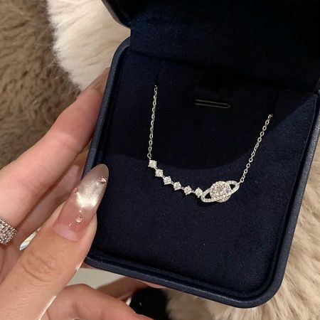 The 925 sterling silver celestial necklace in a premium black jewelry box.