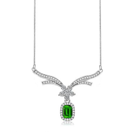 A Drop Necklace Of Elegance In Emerald - A Drop Necklace Of Elegance In Emerald, featuring a green cubic zirconia gemstone pendant with clear accents, set in rhodium-plated silver-tone metal.