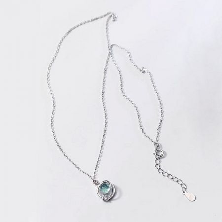 Another angle of the elegant 925 sterling silver planet necklace, highlighting its shine and craftsmanship.