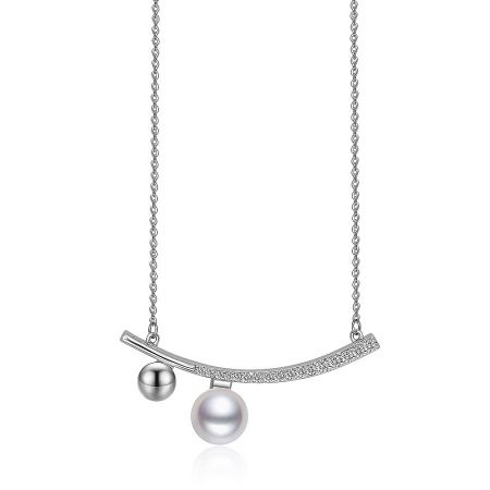 Elongated Bar CZ Pearl Necklace - Close-up of the Elongated Bar CZ Pearl Necklace, showcasing the rhodium-plated pendant with a curved bar of cubic zirconia and a dangling white shell pearl.