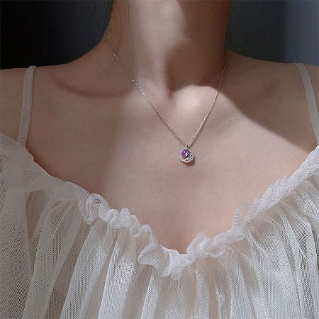 Elegant 925 silver necklace highlighting a vibrant purple gemstone pendant.
