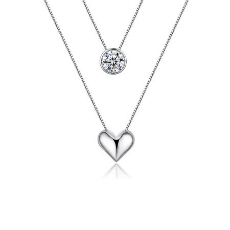 Heart Stone Layered Necklace - Heart Stone Layered Necklace featuring a rhodium-plated heart pendant with a clear cubic zirconia stone, displayed on a white background.