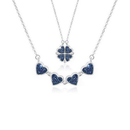 The versatile Four Leaf Clover necklace shown in both its clover and heart-shaped pendant styles.