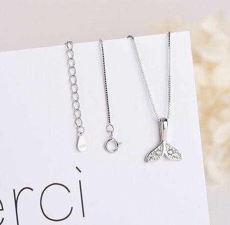 Detailed view of the sterling silver mermaid tail necklace, showing the intricate design and lobster clasp.