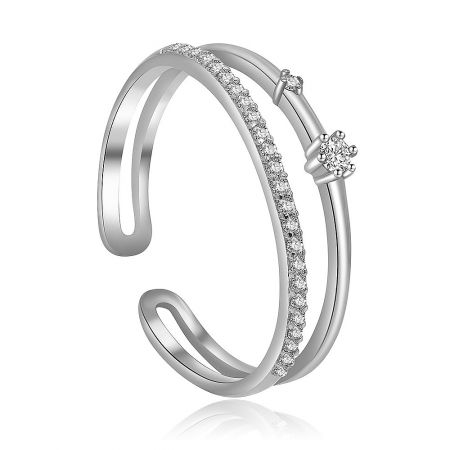 Side view of a silver open-ended bracelet with a cluster of white cubic zirconia stones