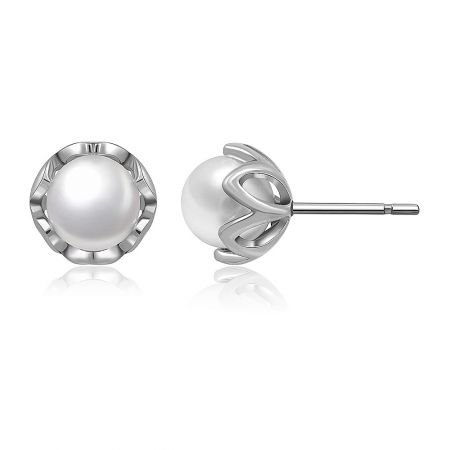 Close-up view of the sterling silver pearl stud earrings showcasing the secure post closure.