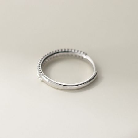 A double band sterling silver ring with a smooth shank and a beaded CZ edge, perfect for fashion jewelry suppliers.