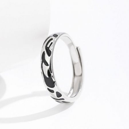 Detailed shot of one of the ginkgo rings, showcasing the textured leaf pattern.