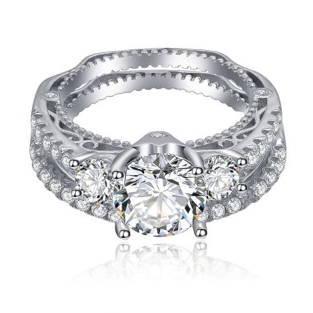 Princess Cut Center with Halo Bridal Ring Set - Elegant Princess Cut Halo Bridal Ring Set in 925 Sterling Silver, featuring a prominent central cubic zirconia surrounded by accent stones.