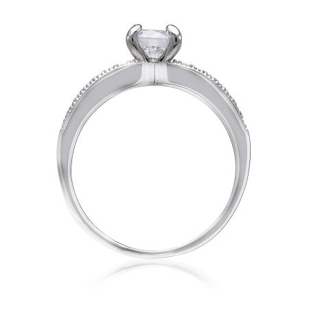 Top-down view of the Past And Future Set ring, emphasizing the clear central gemstone and decorative side stones.