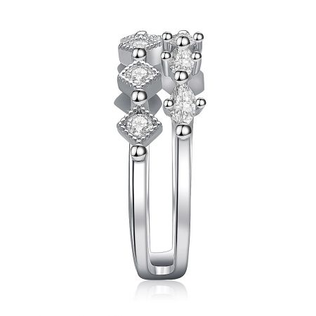 Cluster CZ Adjustable Ring - A close-up of the Cluster CZ Adjustable Ring, showcasing its split shank design and the arrangement of multiple clear cubic zirconia gemstones.