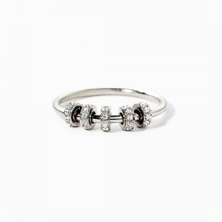 The sterling silver rotating ring with clear white zircon beads.