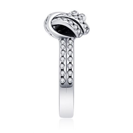 Detailed side view of the Sparkling Love Knot Ring, emphasizing its curved top and the meticulous setting of the cubic zirconia stones along the band.