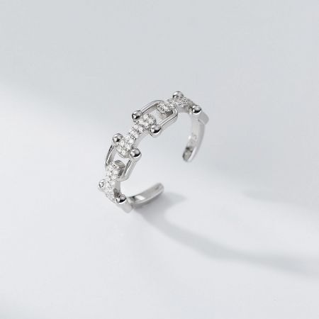 An alternative design from the 5-piece ring set, featuring a curved band with pave-set stones.