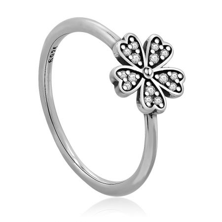 A detailed top-down view of the Dazzling Daisy Silver Ring, highlighting the brilliant cubic zirconia stones set in the floral pattern.