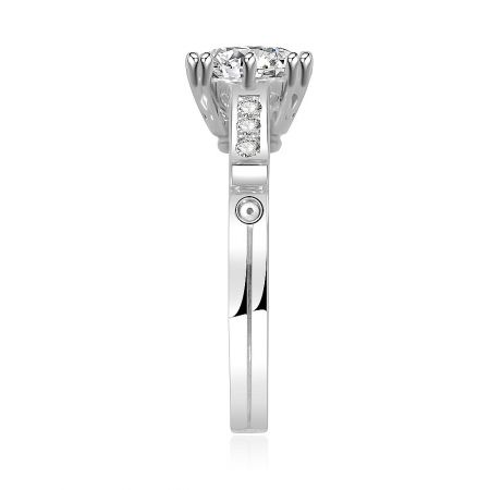 Detailed shot of the White Round Shoulder Ring's band, displaying the craftsmanship of the rhodium plating and stone setting.