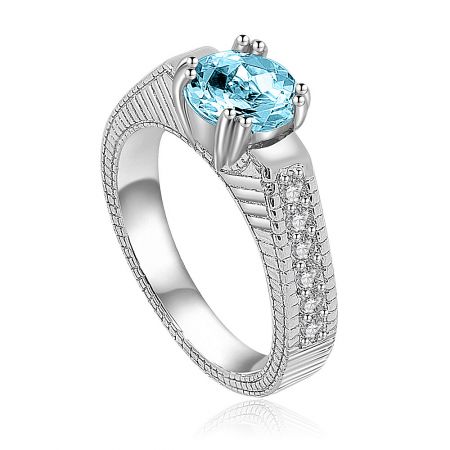 Side profile of the Aquamarine Solitaire Ring, showcasing the detailed craftsmanship of the setting and the sparkling side stones.