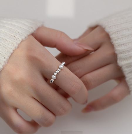 925 Sterling Silver Freshwater Pearl Ring - A model's hand gracefully wearing the 925 Sterling Silver Freshwater Pearl Ring, highlighting its elegant design and lustrous pearl.