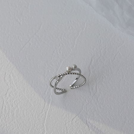 925 Sterling Silver Double Layer Pearl Ring - A detailed studio shot of the 925 Sterling Silver Double Layer Pearl Ring, showcasing its intricate design with a central freshwater pearl and surrounding cubic zirconia stones.