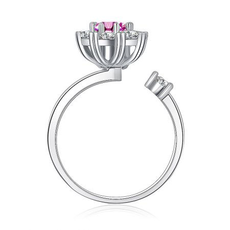 Angled shot of the Pinky Flower Spinning Ring, displaying the brilliance of the rhodium plating and the flower-like gemstone arrangement.