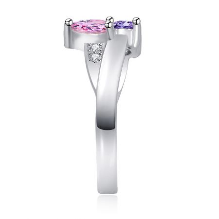 Angled perspective of the Double Heart Ring, emphasizing its elegant design and the brilliant shine of the cubic zirconia stones.