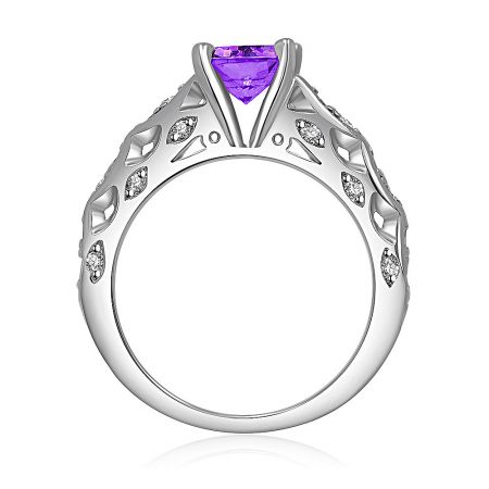 Close-up detail of the Amethyst Roman Edge Ring's central purple gemstone and surrounding clear stones.