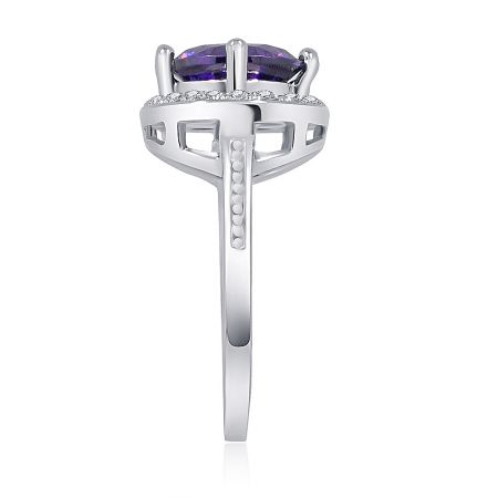 Close-up detail of the purple gemstone and surrounding white zirconia halo on the silver ring.